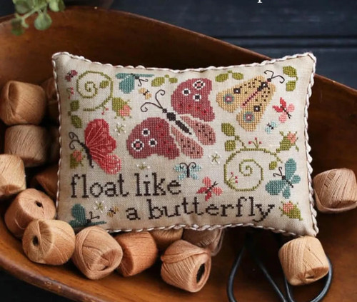 Float cushion cross - cushion, stitch